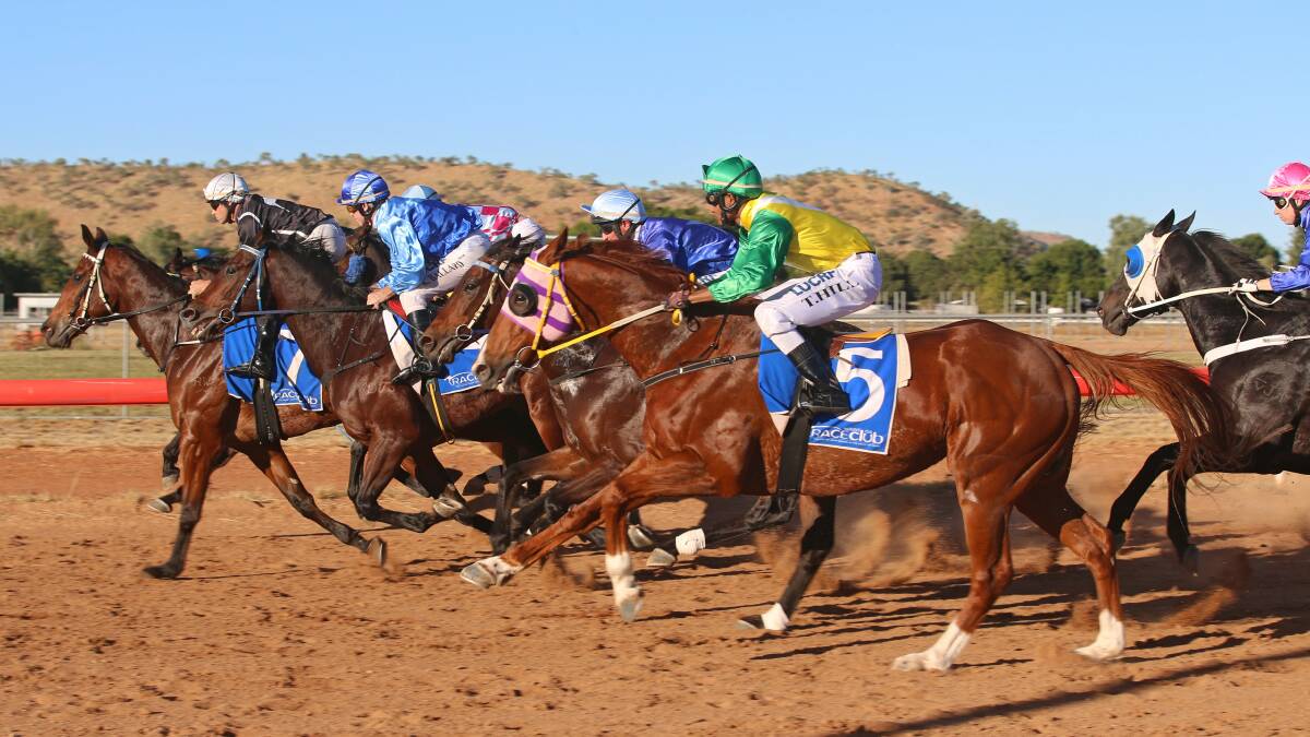 Race 6, Mount Isa Cup 2017 after barrier jump -  winner Chestnut Road on the outside ridden by Terrence Hill. Photo: Sharon Crossland