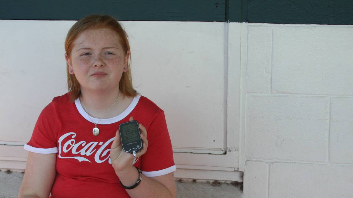 SUGAR SUGAR: Abby Stuart (11) shows us her insulin meter and kit, which she uses up to 7 times a day. An insulin pump would mean no more pesky injections at every snack.