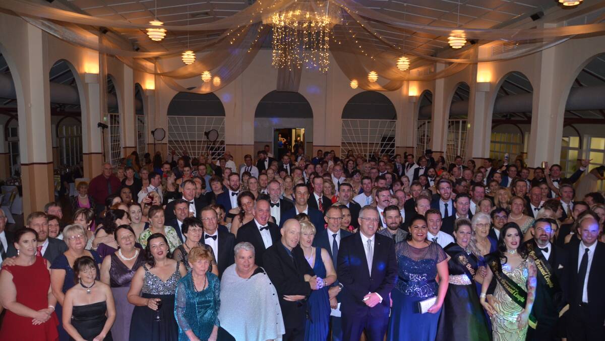 Federal Treasurer Scott Morrison (front centre right) was not left out of the big group ball photo at C150 ball. Photo: Esther MacIntyre