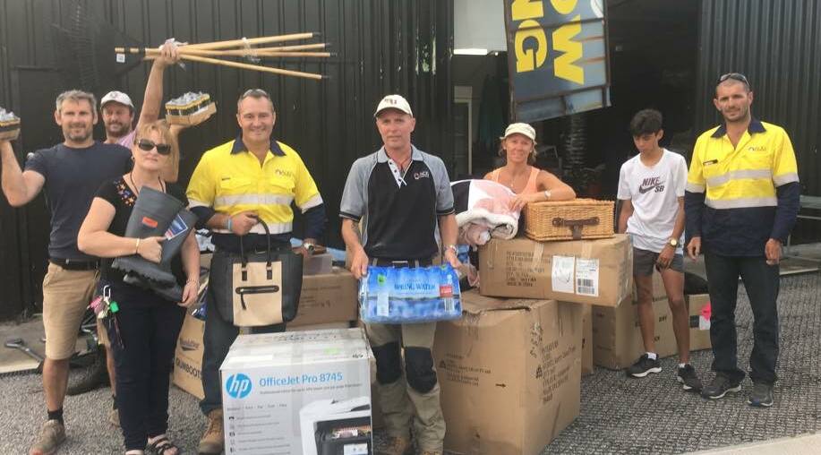 WHAT A RELIEF: Matt McKeown, Doug Gage, and Anthony Facelli from ADG Corporation drove from Mount Isa to Airlie Beach to deliver much needed supplies. Photo: supplied