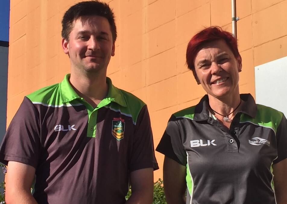 Touch refs Kerrod Hall from Townsville and Fiona Quinn from Mackay, in Mount Isa.