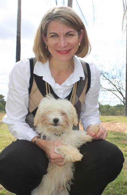 Mayor Joyce McCulloch with a well-loved and very much registered pup. Photo: supplied