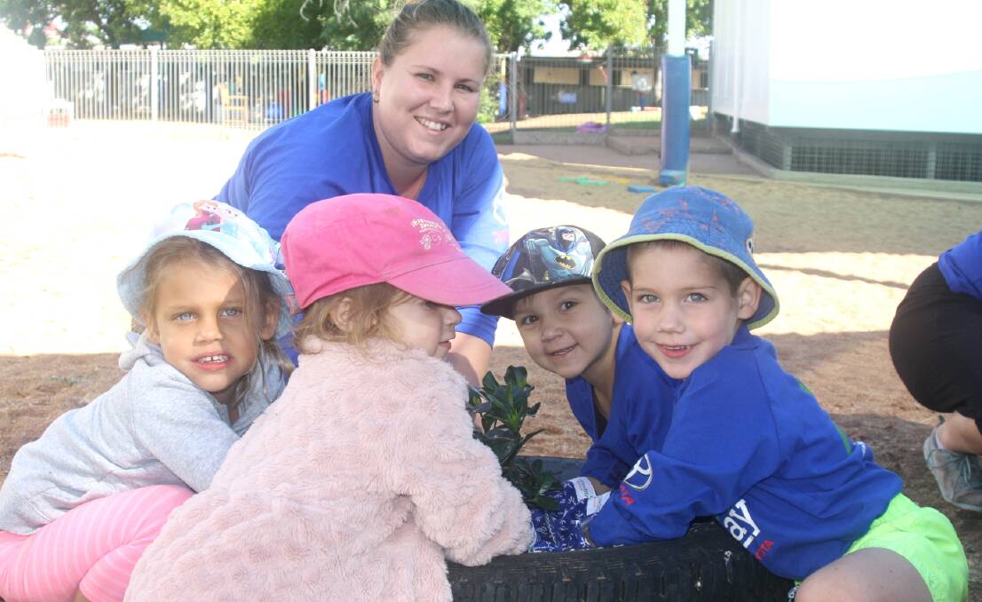 GREEN FINGERS: Tree planting at St Paul's Lutheran Church Childcare Centre for Schools Tree Day went down a treat with these young gardeners. Photo: Esther MacIntyre 
