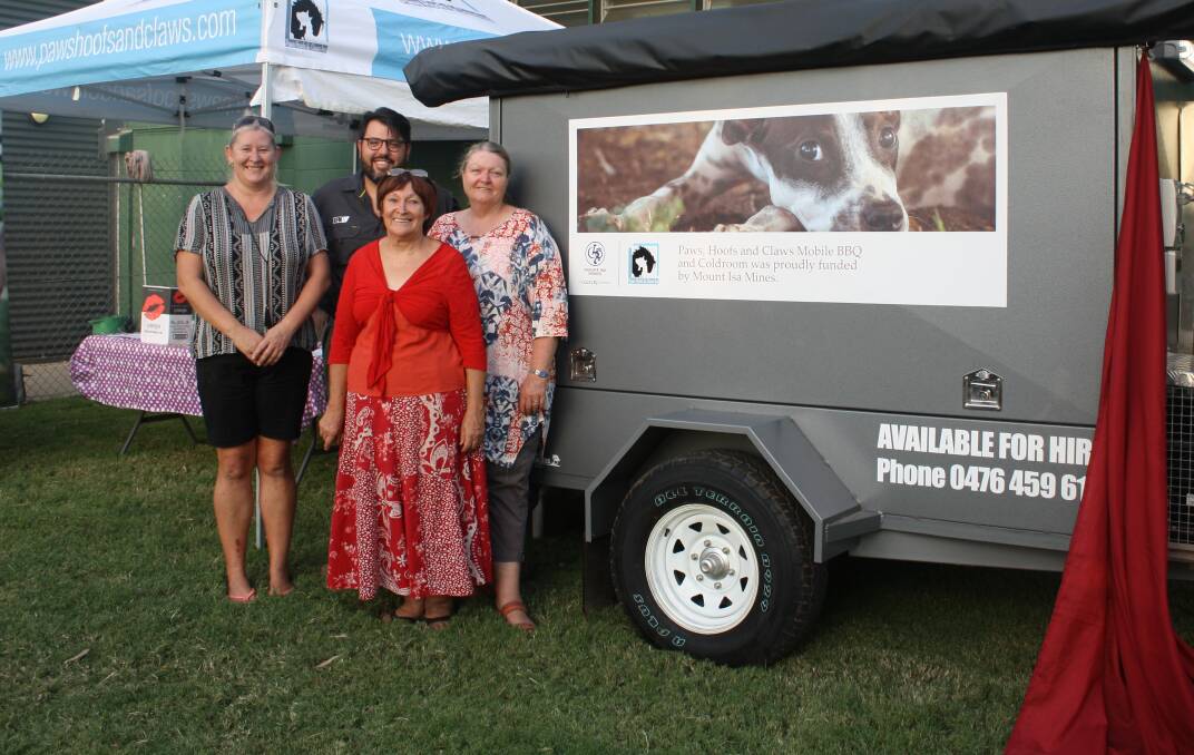 UNVEILING: Mount Isa Mines Operations Manager Stuart Reid with Paws Hoofs and Claws Administration Officer Paula Boon, President Sue Carson, Secretary Tami Shorter, with the new purpose-built trailer. Photo: Esther MacIntyre