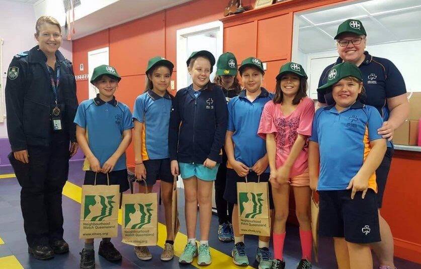 PLAN AND PREPARE: Sergeant Cath Purcell with Mount Isa Girl Guides getting ready for their Preparedness Badge, and leader Jarli (Leanne Edge). Photo: supplied