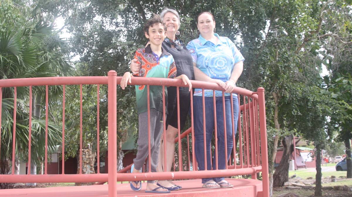 REMEMBRANCE: Judy Martyr (centre) with grandson and daughter Jodi, at the Kalkadoon Keeping Place during Naidoc Week. Photo: Esther MacIntyre