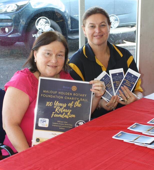 ROTARY BALL: Marie Breen and Tracy Pertovt selling tickets at Malouf Holden.