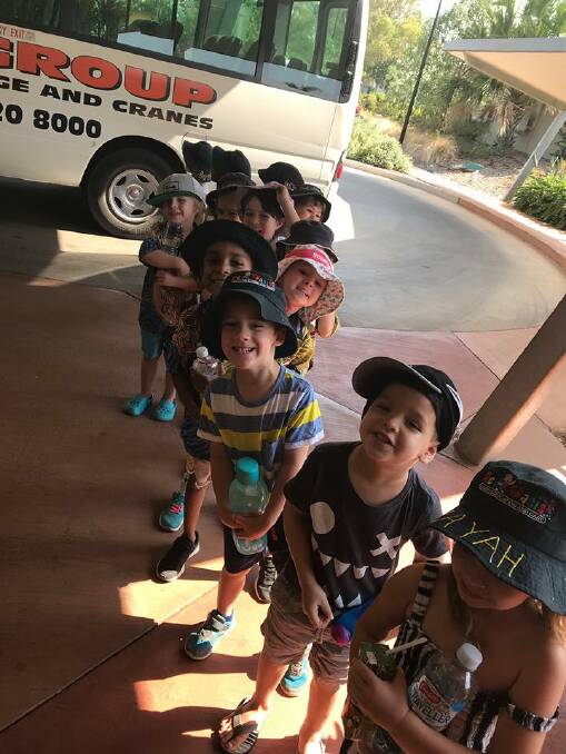 Some excited kindy children after their first bus trip, about to go into the Laura Johnson home.