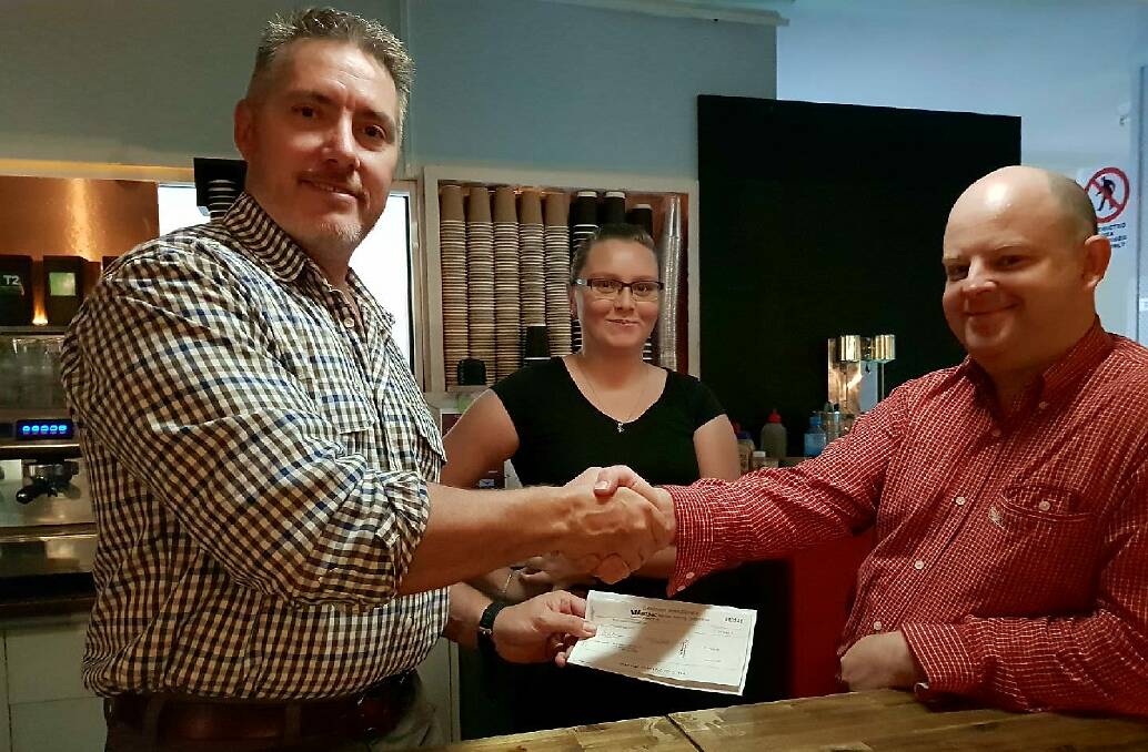 Councillor Brad Rix presents the Cloncurry MultiSkill Centre with a cheque for $500, donated from his remuneration increase. 