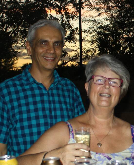 VALENTINE'S EVE: Paul and Sandy Silva enjoy a glass of bubbles as the sun sets on Outback at Isa's amphitheatre on Tuesday. Photo: Esther MacIntyre