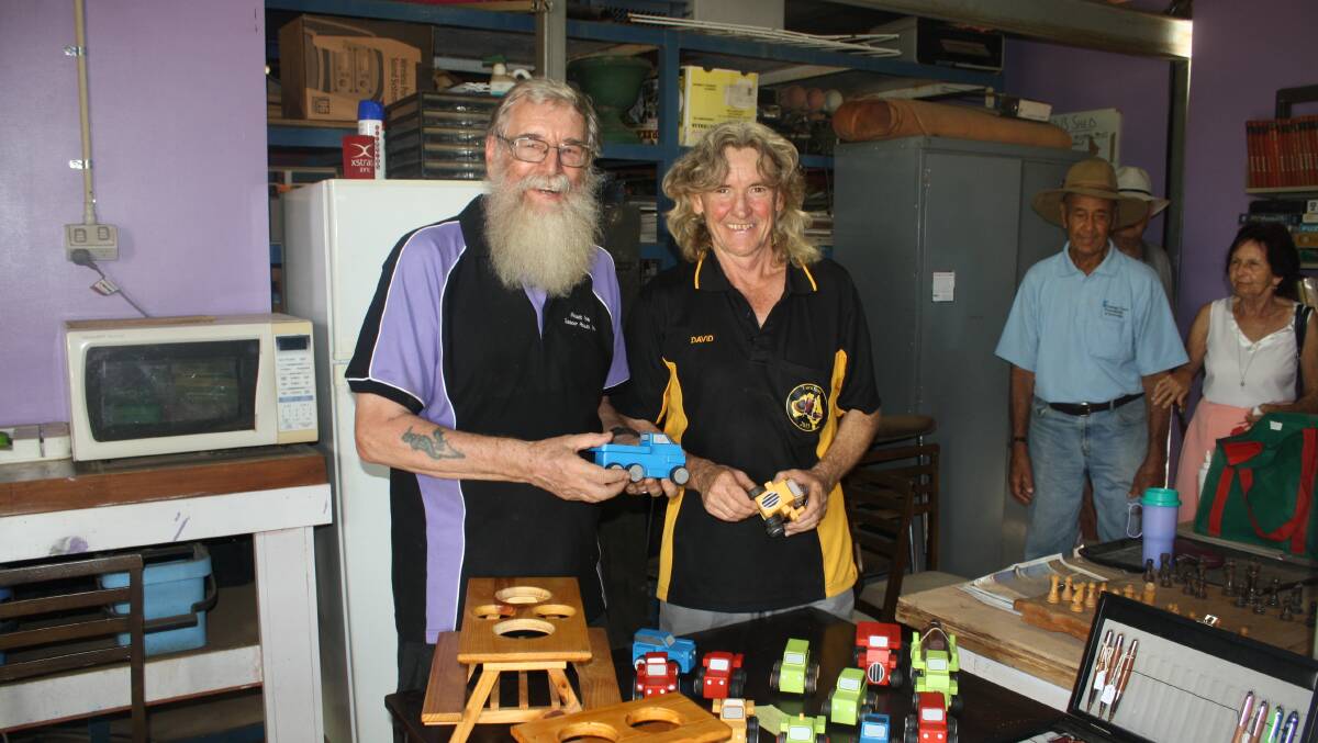 MEN'S SHED: Richard Lane and David English show off their handcrafted wooden toys at Men's Shed, 2 Isaacson Road. Photo: Esther MacIntyre