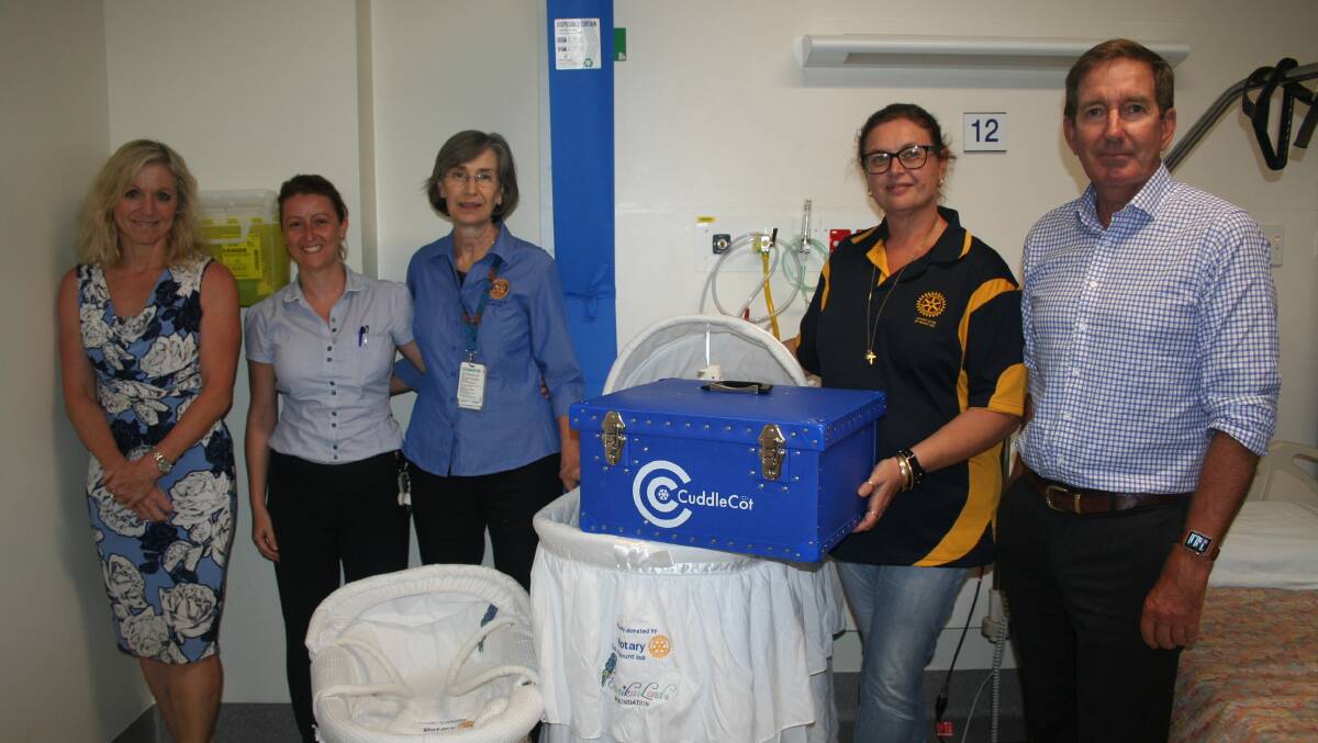 CUDDLE COT: NWHHS Chief Executive Lisa Davies Jones, Maternity Nurse Unit Manager, Liz Milroy, Nursing Director and Rotary member, Dr Julie Parry, Rotary President, Tracy Pertovt, and NWHH Board Chair, Paul Woodhouse.