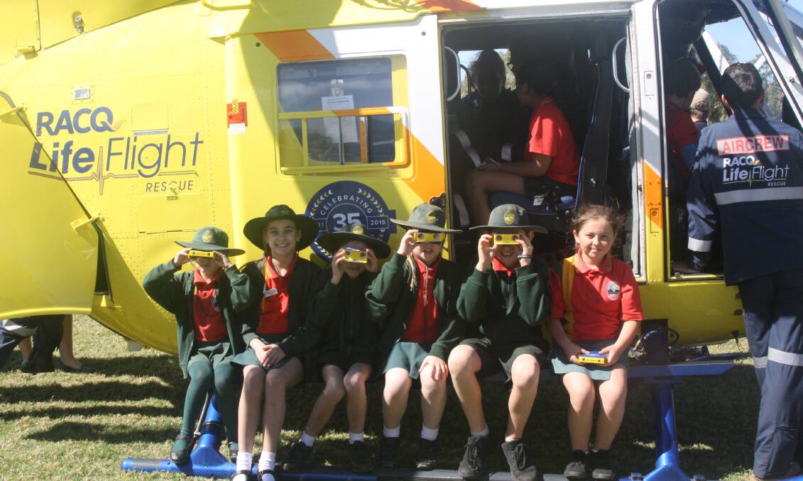 NEW HELI: St Kieran's Catholic School students take a sneak peak at the new rescue chopper, through their LifeFlight goggles. Photo: Esther MacIntyre