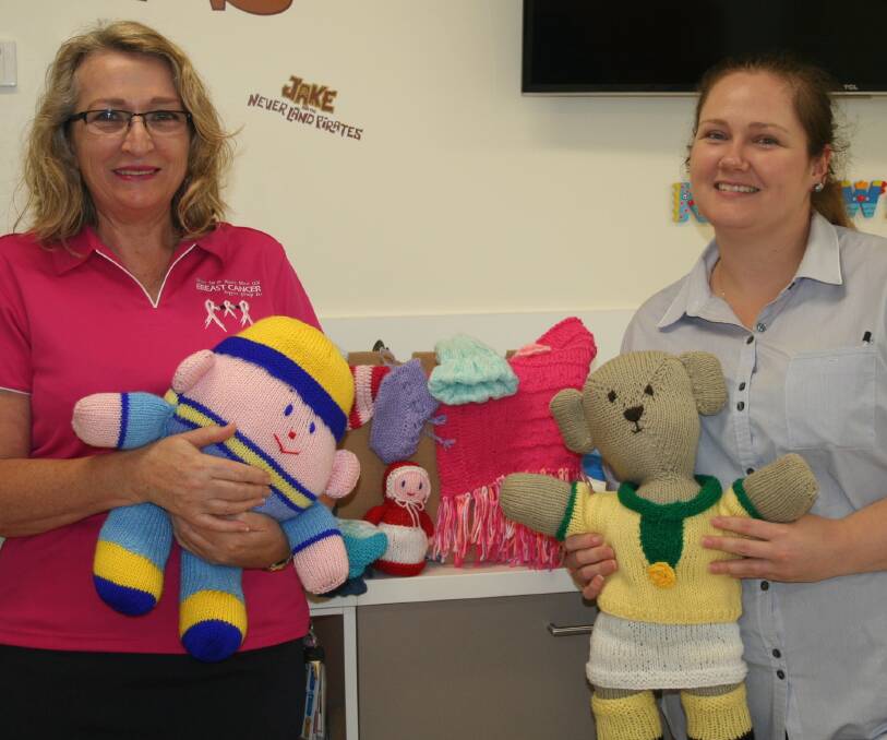 TOYS FOR TOTS: Registered nurses Janelle Bookallil and Justine Law with some of the knitted goodies for the Children’s Ward. Photo: North West Hospital and Health Service.