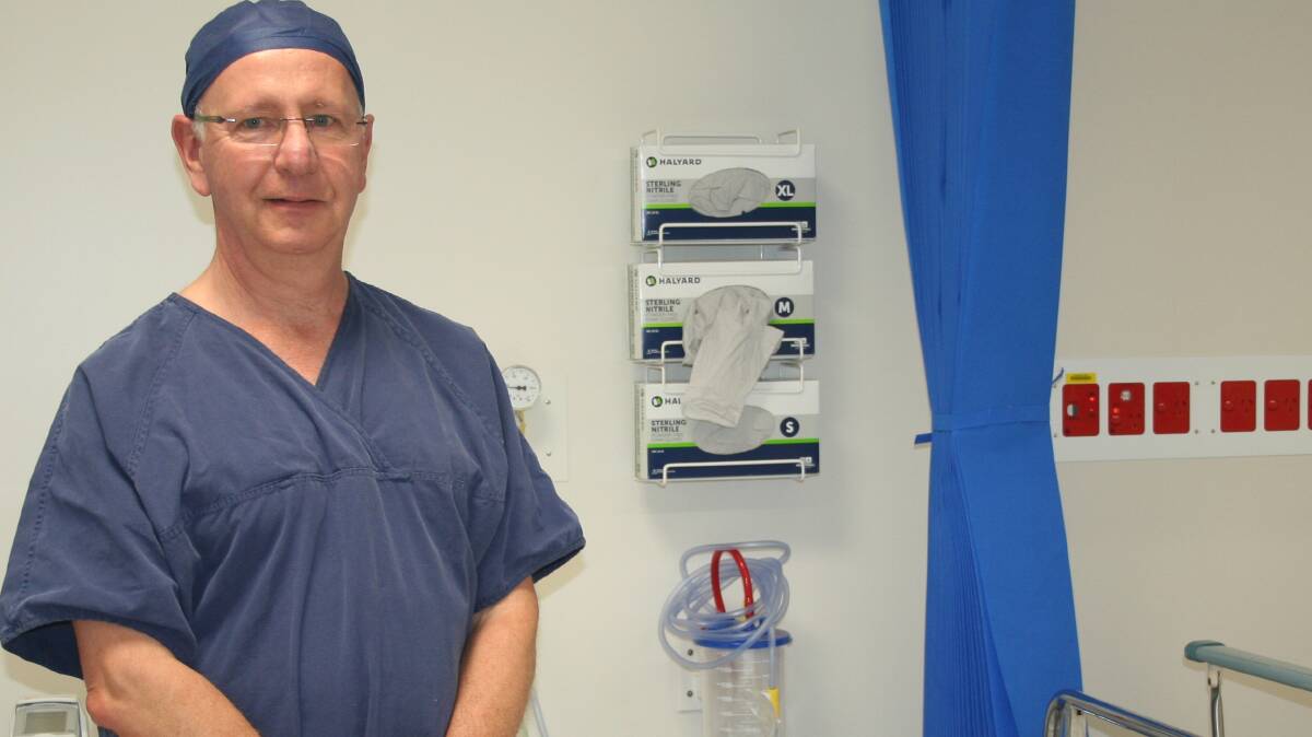 EYE DOC: Opthalmologist Dr Andrew Foster, takes a pause in between some of the 19 cataract surgeries. Photo: supplied
