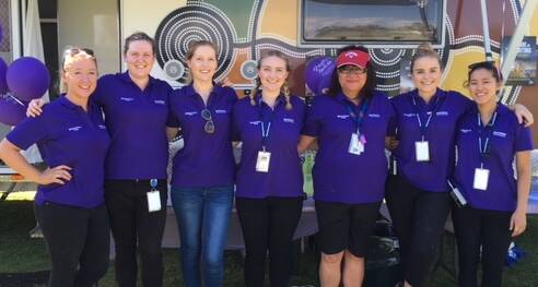 Some of the NWHHS oral health team with the Gidgee Dental van at a previous Deadly Smiles event. Photo: supplied