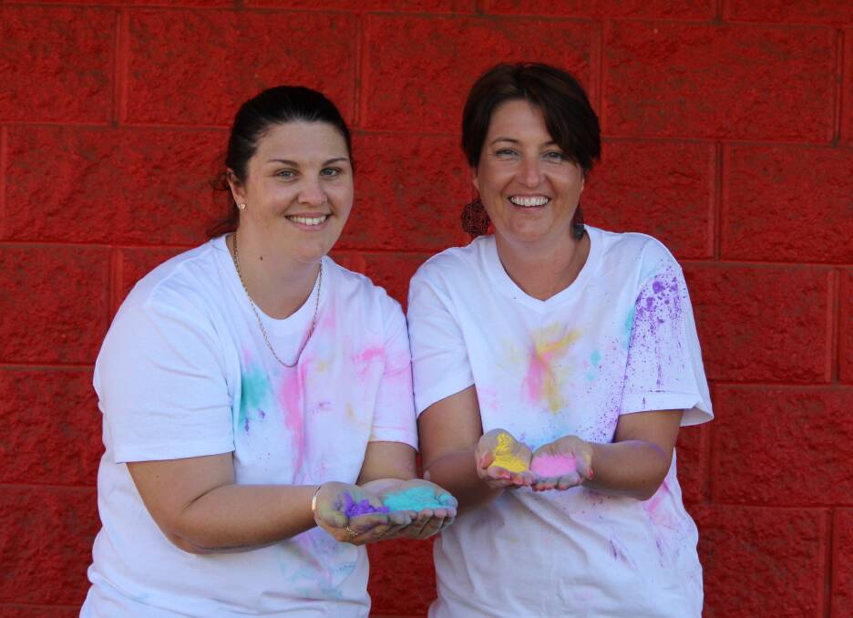 PINK BITZ: Rebekah Moore and Emma Harman have been hard at work planning powder and treats for Colours For Cancer on June 4. Photo: file