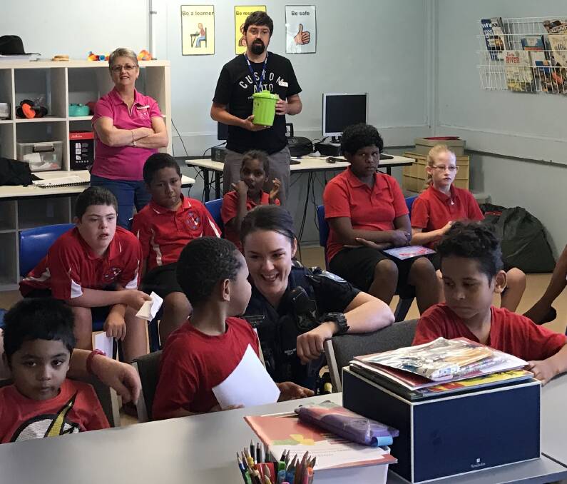 ADOPT-A-COP: Constable Leanne Ernst visits Mount Isa Special School to meet the kids and hand out certificates. Photo: supplied