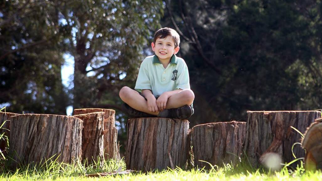 Mount Ousley Public School Year 2 student Jack Khan, aged 7 has set up a gofundme page to raise money for a planned outdoor learning area at the school. Picture: Sylvia Liber
