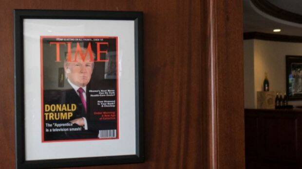 A fake edition of Time Magazine with Donald Trump on the cover hangs in a number of Trump properties. Photo: Screengrab/Washington Post