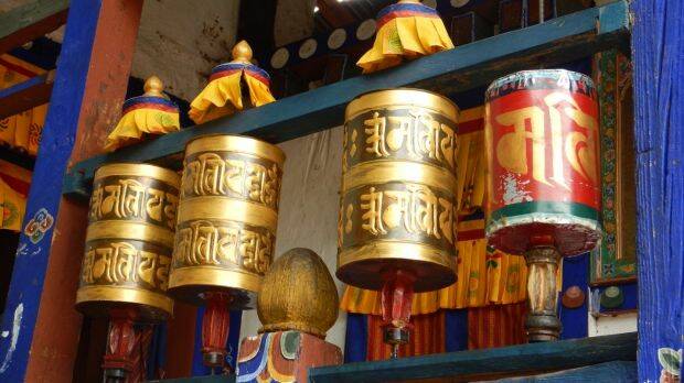 Spinning a prayer wheel helps accumulate wisdom and good karma in Bhutan. Photo: Nick Abrahams

