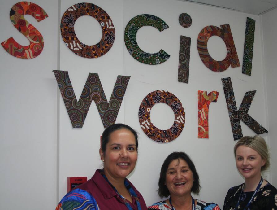 SOCIAL WORK: Christine Mann, Chrissie Lynn and social worker Sarah Adkins work together to make to a fairer and just society. Photo: Supplied