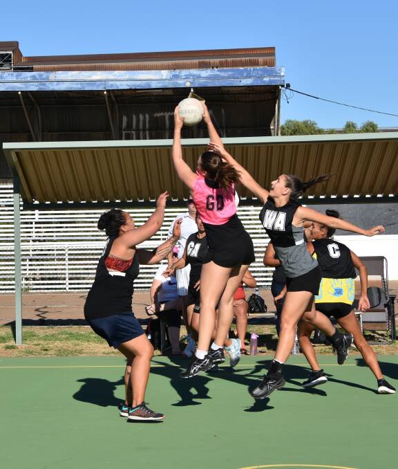 WAITANGI MATCH: New Zealand takes on the World in netball at Wellington oval, Mount Isa. Photos: Melissa North