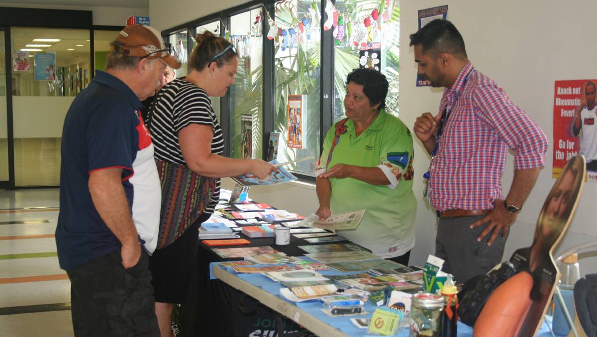 QUIT SMOKING: Senior Health Worker Venessa McDonald and Cardiac Nurse Practitioner Godfrey Ajgaonkar give information and advice to members of the public at the smoking cessation stall.