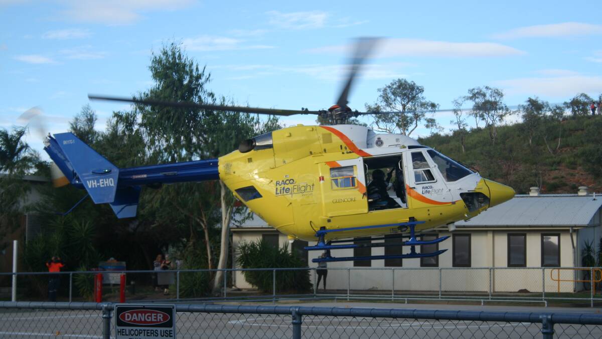 The RACQ LifeFlight chopper comes in for landing.