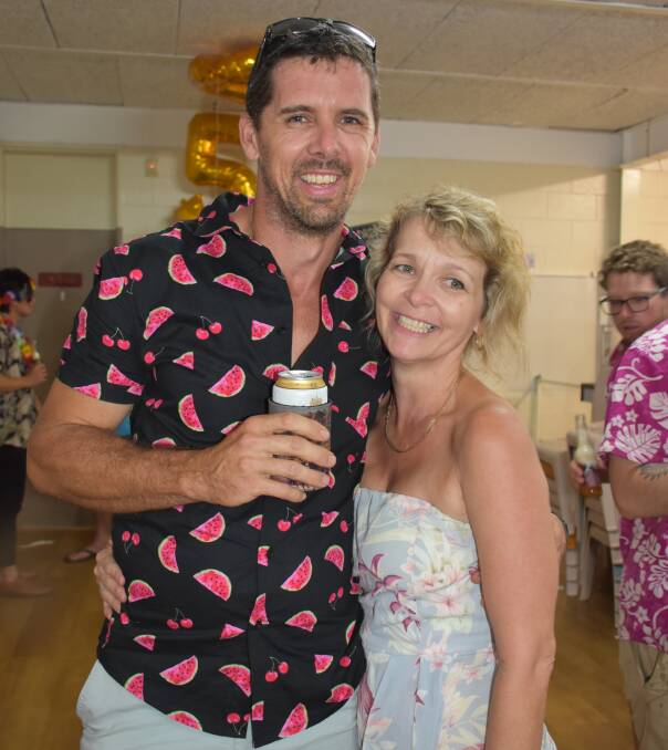 BIRTHDAY GIRL: Lisa Johnstone and Anthony Lawler celebrate with a drink. Photos: Melissa North