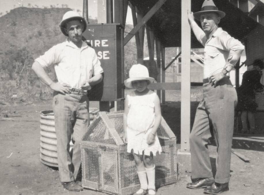 Little Finnish girl, Aria Hovi  with 'mine bosses' for whom her aunt Katri Hovi cooked. Circa 1929.