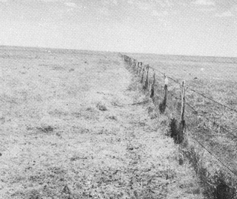 Border: A fence along the Queensland and Northern Territory Border as it once stood. Photographs courtesy of Mrs Ada Miller.