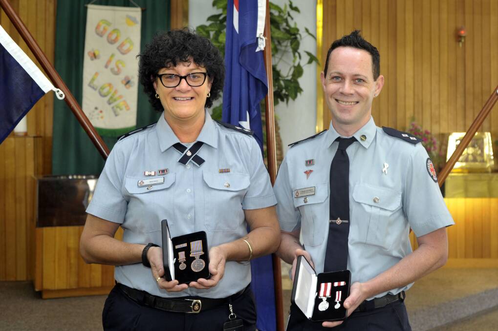 Craig Hansen, Matt Steer, Melissa Cheshire and Mount Isa MP Robbie Katter talk after the annual Queensland Ambulance Service remembrance day, Thursday September 14, 2017. Craig Hansen received his 10 year service medal and Melissa Cheshire received her 25 year service medal at teh ceremony.  Photo courtesy Robbie Katter's office