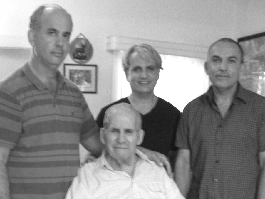 Family: Nick Alexi and his adored three sons, Stavros, Vassilli and Alexi at home on Christmas Eve 2013. Photo: Supplied.