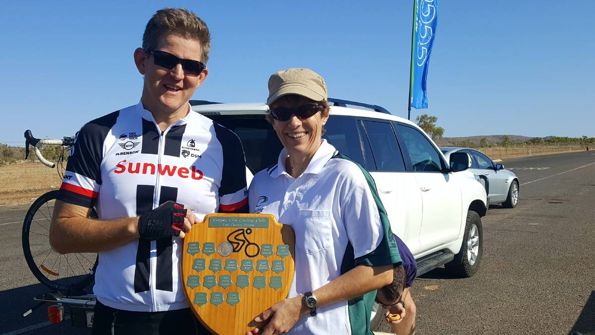 All smiles: Last Chance Handicap Winner Doug Humphries accepts the trophy from Commissaire Linda French. Photo: Supplied