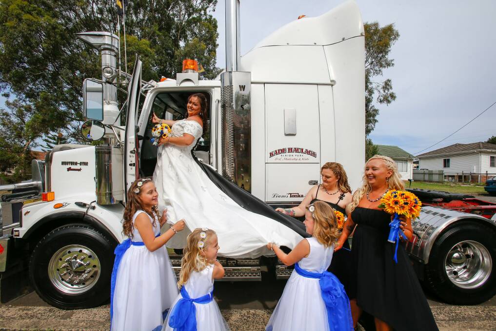Long-time Convoy supporter Michelle Hockey about to head down the isle on Sunday, with a hint of black - this year's Convoy colour scheme. Daughters Richelle Walchli, Makenzie Lowe, Tabatha Noble, and bridesmaids Leslee Cox and Kellie Breeze help Michelle get into the bridal truck. Picture: Adam McLean