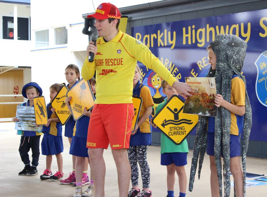 STAY SAFE: Lifesavers visit schools across North West Queensland to convey beach safety messages before summer arrives. Photo: Samantha Walton.