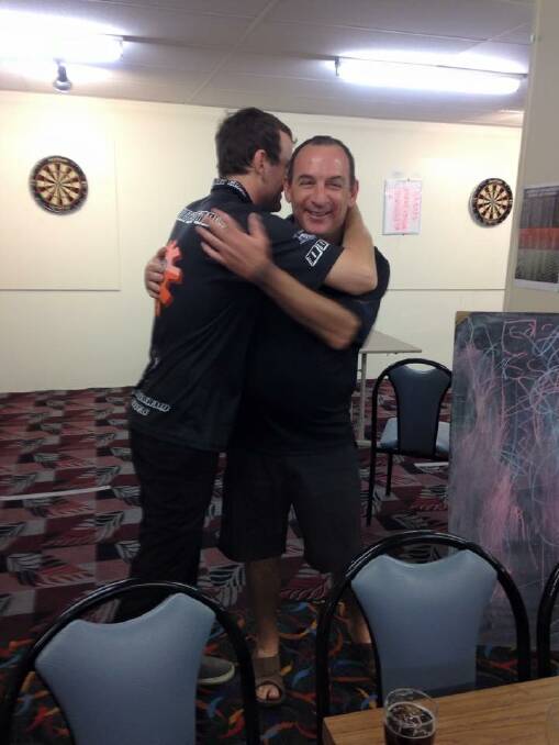 Scott Ramsbotham celebrating with Phil Robinson after there intense victory over NQ contracting 