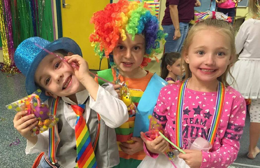 PARTY TIME: Students dressed up for their Rainbow Disco last Thursday to help celebrate their Under Eight's Day. Photo: Samantha Walton.