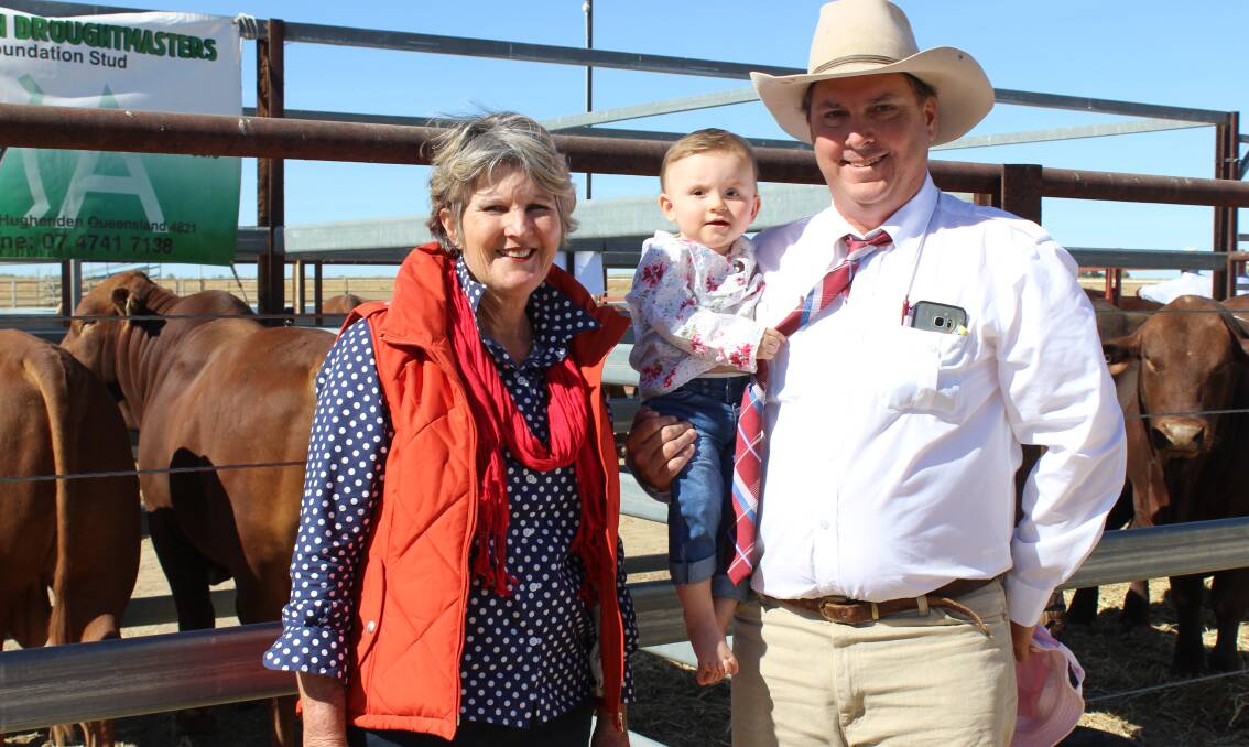 Volume buyer Leigh Propsting from No 27 Pastoral Company, Acton Station, Richmond with Agent Matthew Kennedy and his daughter Rose.