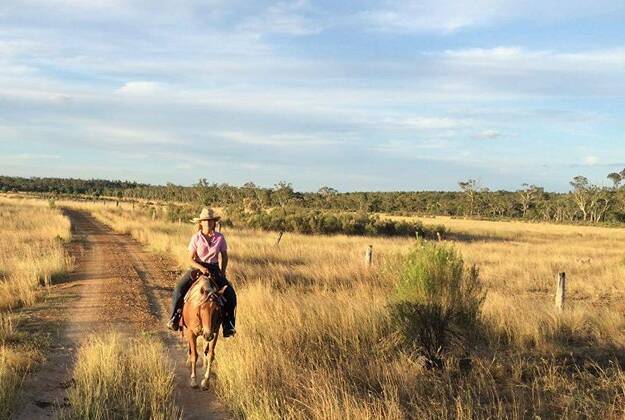 Erica Andersson comes back from a hard day mustering in rural Queensland.