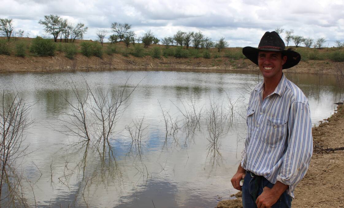 RESTORED: Landholder Nigel Simmons overlooks his dam that was once full of sulphuric acid. Photo: Samantha Walton.