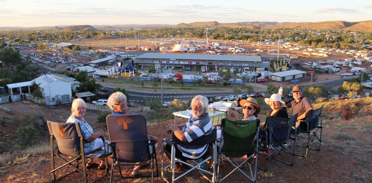 WHAT A VIEW: Tourists from Tasmania, Adelaide and Queensland who randomly met in Mount Isa enjoy the Rodeo Week view from the lookout.