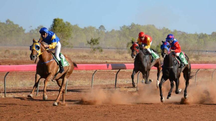 LAST YEAR: Carry Me, Isle Be Ready and Holey Gadoley nearing the end in the Brodie Hardware Cloncurry Cup Open Handicap 1400 metres.