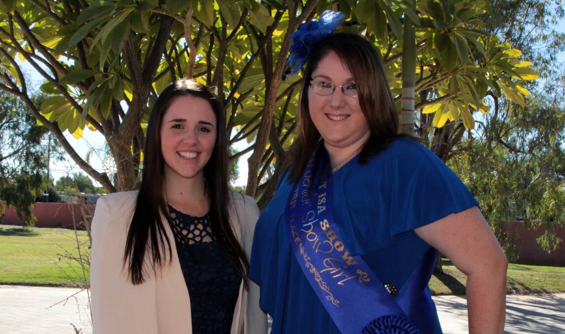 Longreach showgirl, Tiffany Davey (left) seals state position over Mount Isa showgirl Priscilla McCrindle (right) in the Central and North West Queensland competition at sub-chamber.