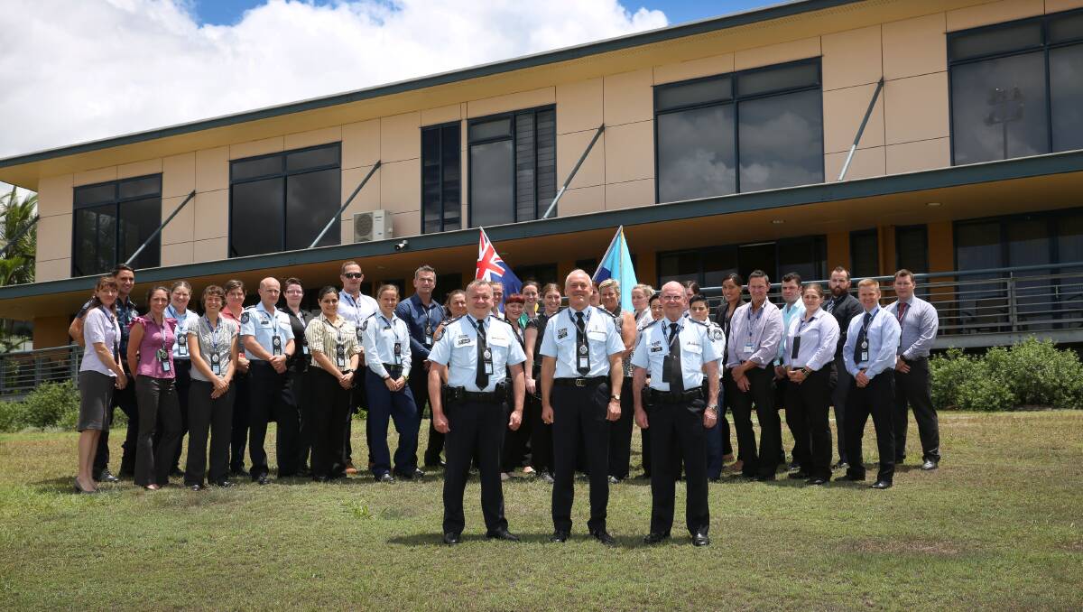 Superintendent David Tucker, Deputy Commissioner Ross Barnett and Assistant Commissioner Paul Stewart with course participants at the QPS Academy, Oxley campus.