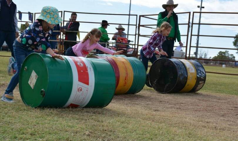 Barrel Race: Children racing in the 6 to 9 years division of the Ringers Rally at Cloncurry Show last year. Photo: Chris Burns.