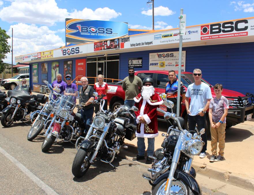 HO, HO, HO: Mount Isa Hogs, The Boss Shop, Mob FM, Mount Isa Coaches and The North West Star prepare for this year's Christmas Light Cavalcade. Photo: Samantha Walton.