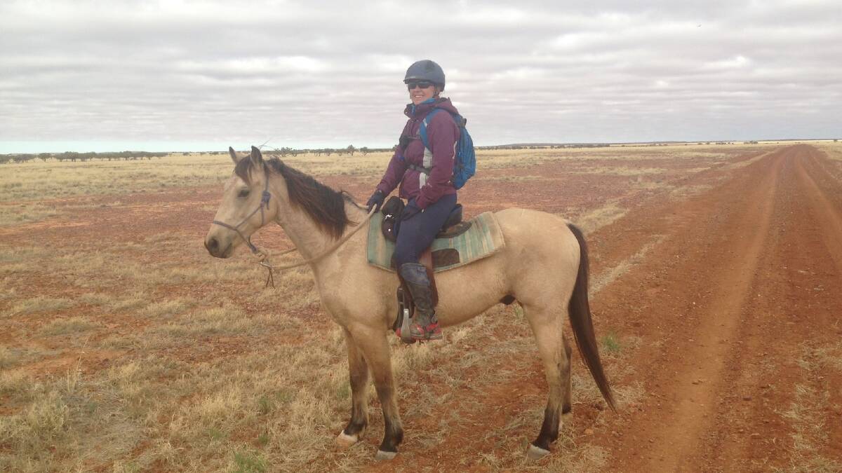 ENDURANCE: co-manager of Linda Downs station Camille Champagne preparing for the Mongol Derby. Photo supplied.