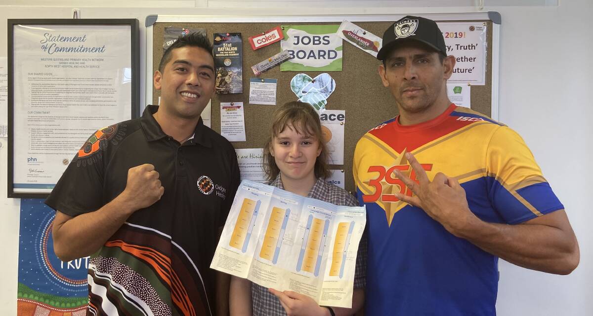 MENTORSHIP: Marcel Noronha, Lilly-Rose Batten and John Doyle checking out her great school results. .